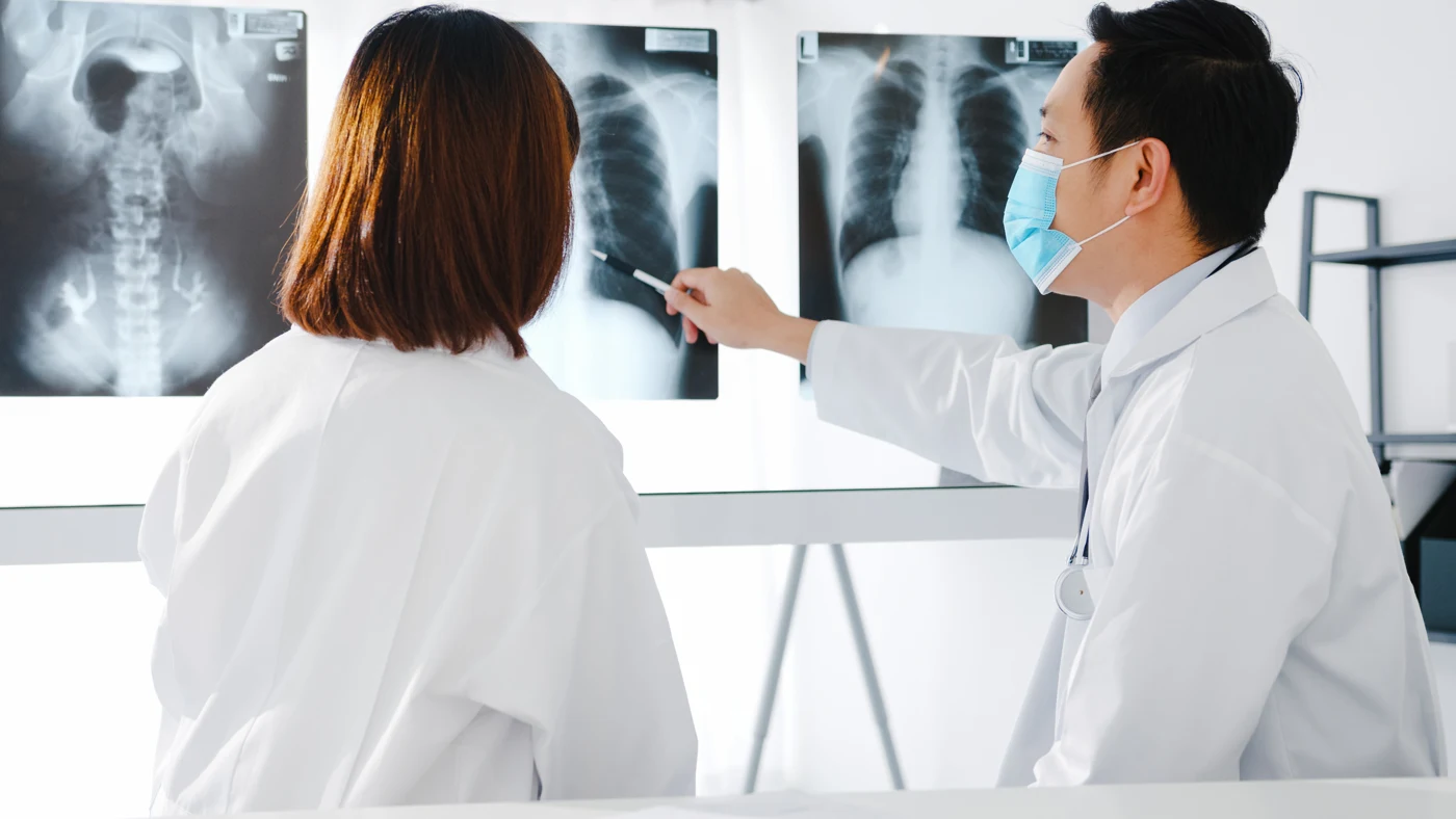 Medical professionals reviewing diagnostic images together